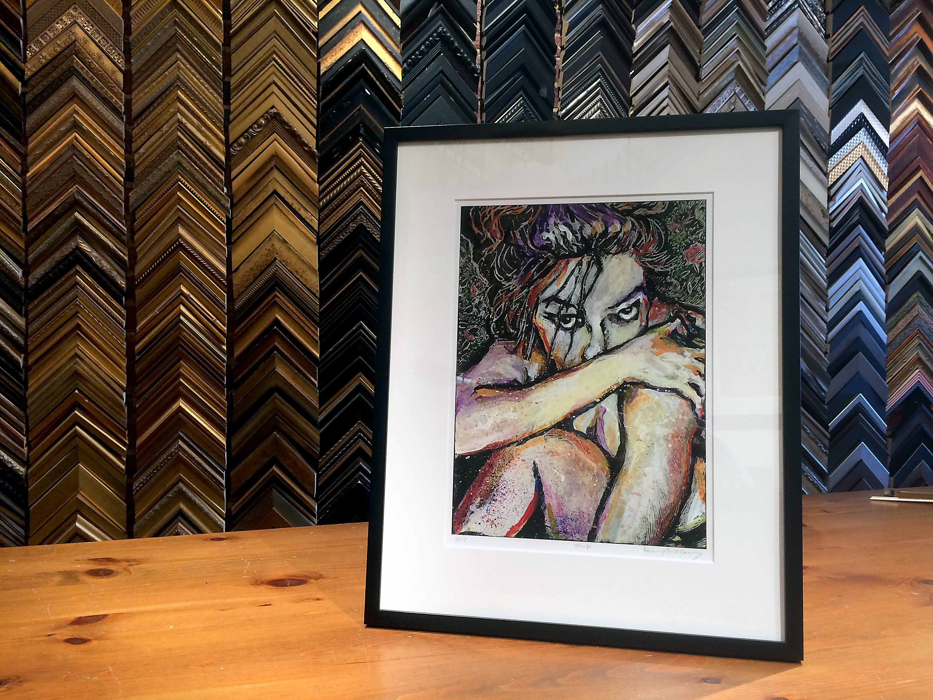 Standard print sizes make framing easier - Rosemary Covey's art in basic black frame in an Alexandria Frame Shop.